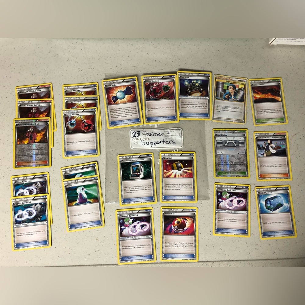 23 Pokémon trainer and supporter cards